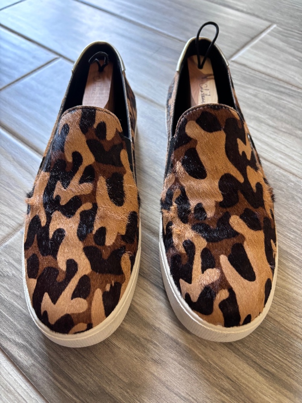 Cole Haan cheetah slip ons
